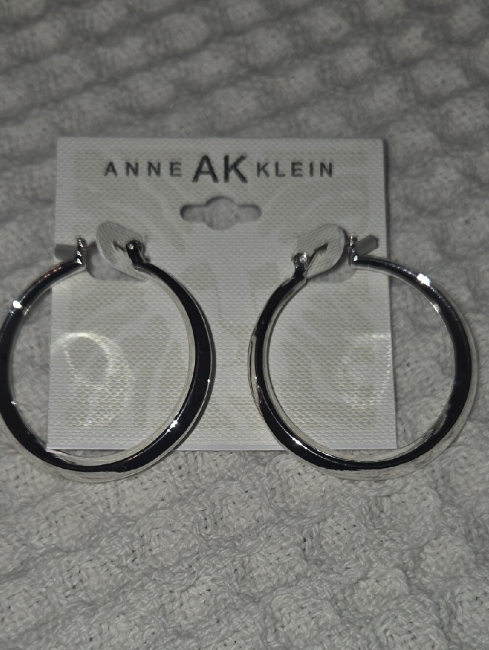 Anne Klein Shiny Silver Rounded Hoop Earrings